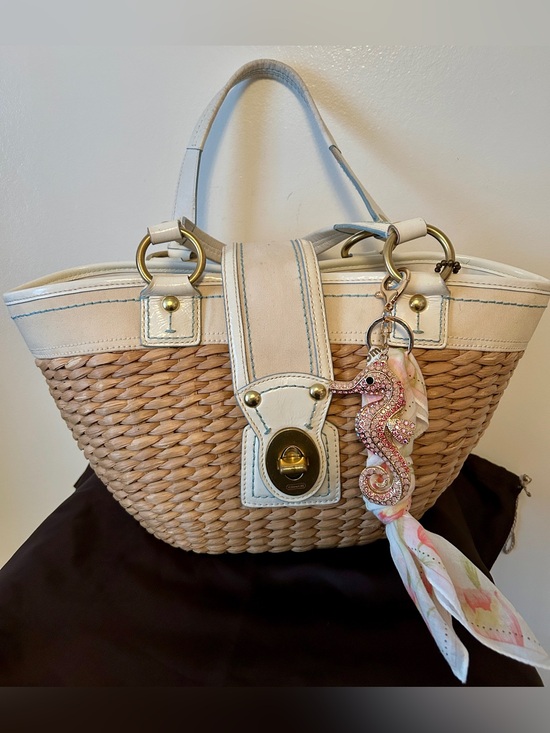 Coach Handbags - Coach Y2K wicker tote, with white trim and aqua blue stitch-ing. Purse Charm